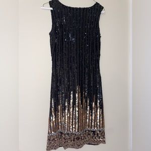 Black and gold sequin dress